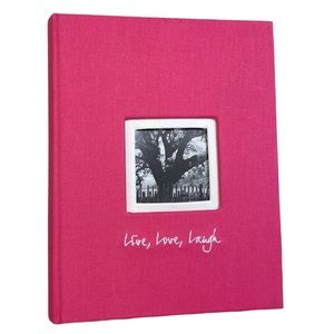 Photo album. Pink. Holds up to 160 photos. Like new. Live love laugh.